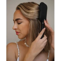 Gepatenteerde haarborstel met zelfreinigende functie